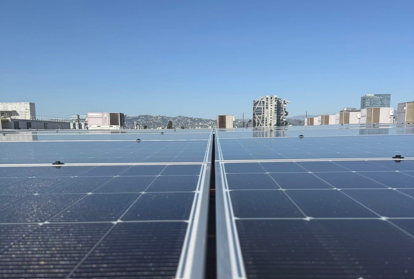 solar panels on roof of a high rise building